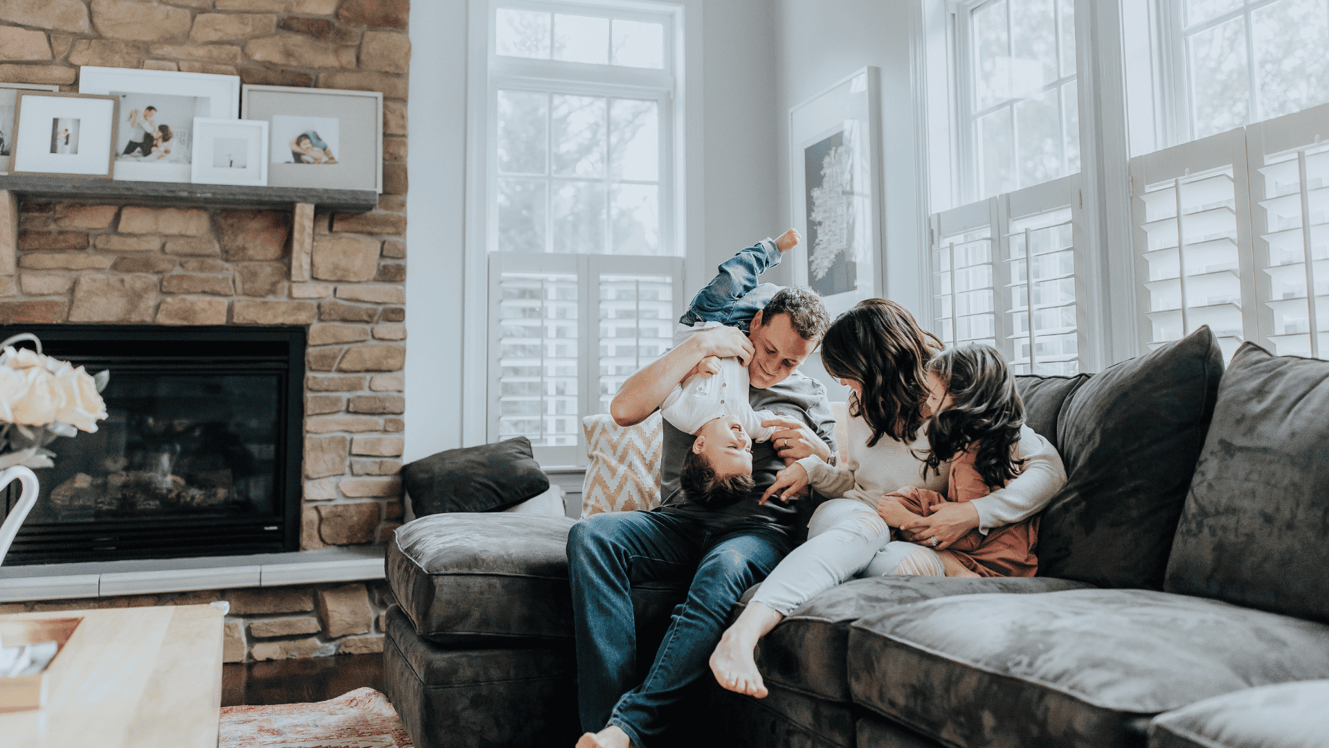 Family enjoying time together on a couch